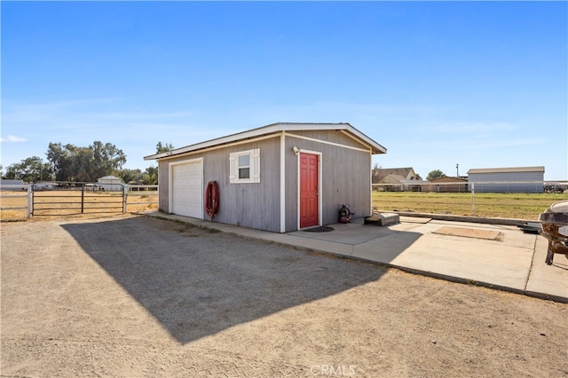 view of outdoor structure with a garage