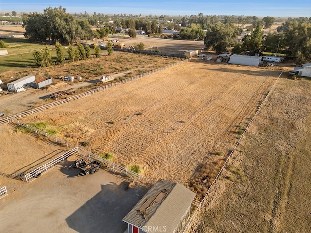 birds eye view of property featuring a rural view