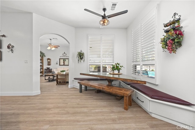 dining room featuring ceiling fan and light hardwood / wood-style flooring