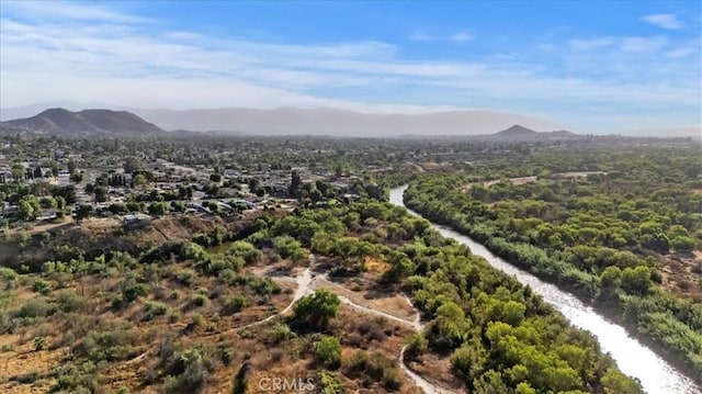 birds eye view of property featuring a mountain view