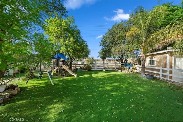 view of yard featuring a playground