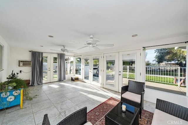 sunroom with plenty of natural light and french doors