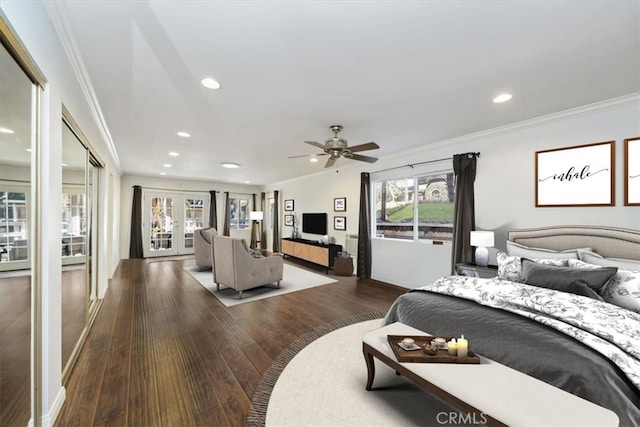 bedroom with ceiling fan, dark hardwood / wood-style flooring, crown molding, and french doors