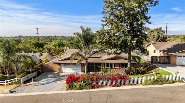 ranch-style home featuring a garage