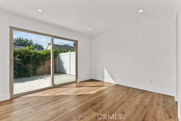 empty room featuring light hardwood / wood-style floors