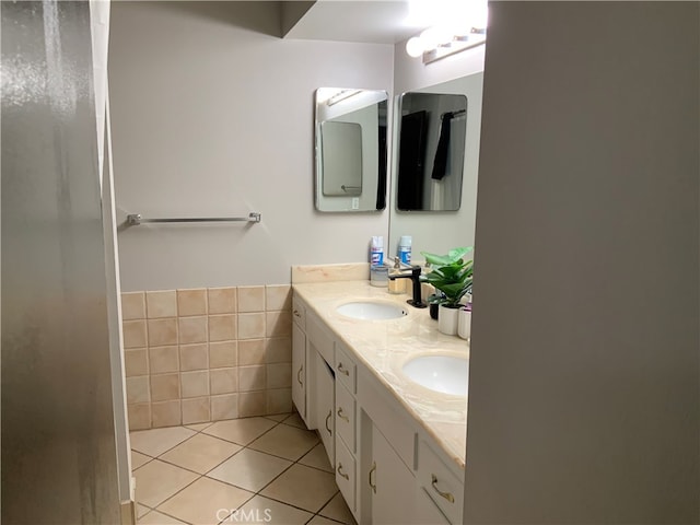 bathroom with vanity and tile patterned flooring