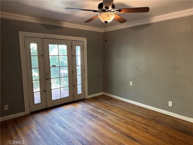 doorway to outside featuring ceiling fan, crown molding, and hardwood / wood-style floors