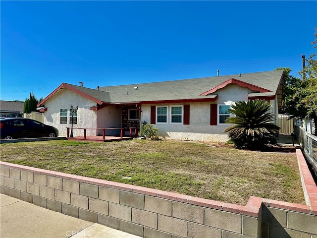 view of front of home with a front lawn