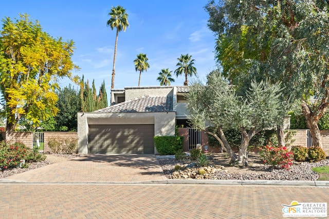 view of front of property with a garage