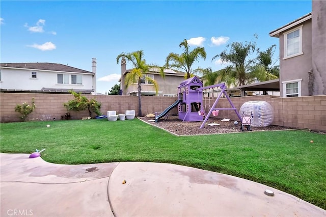 view of playground featuring a yard