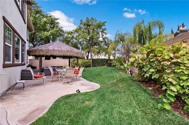 view of yard featuring a gazebo and a patio area