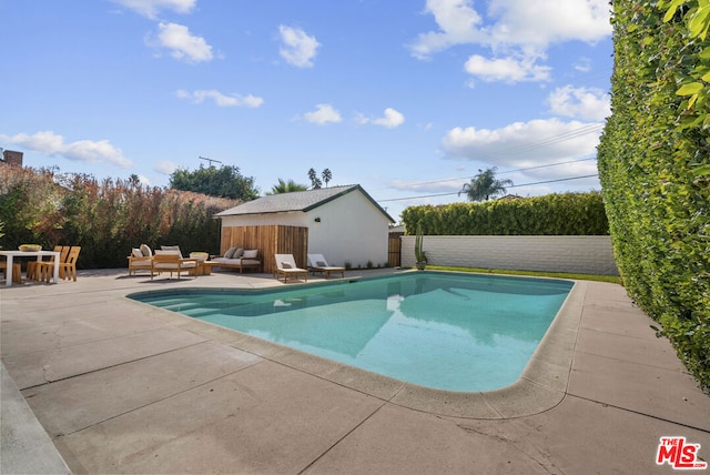 view of pool featuring a patio area