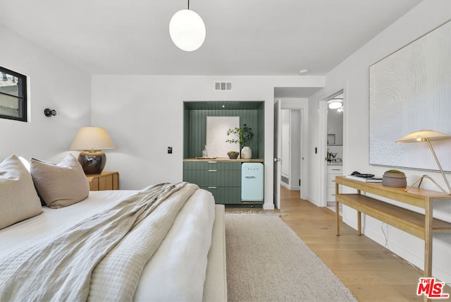 bedroom featuring light hardwood / wood-style floors