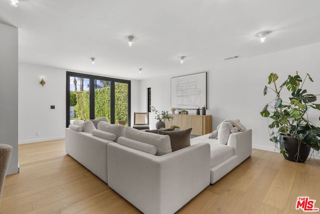 living room featuring light hardwood / wood-style floors