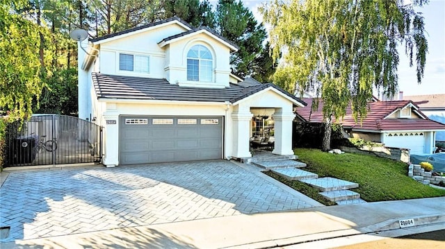 front of property with a garage