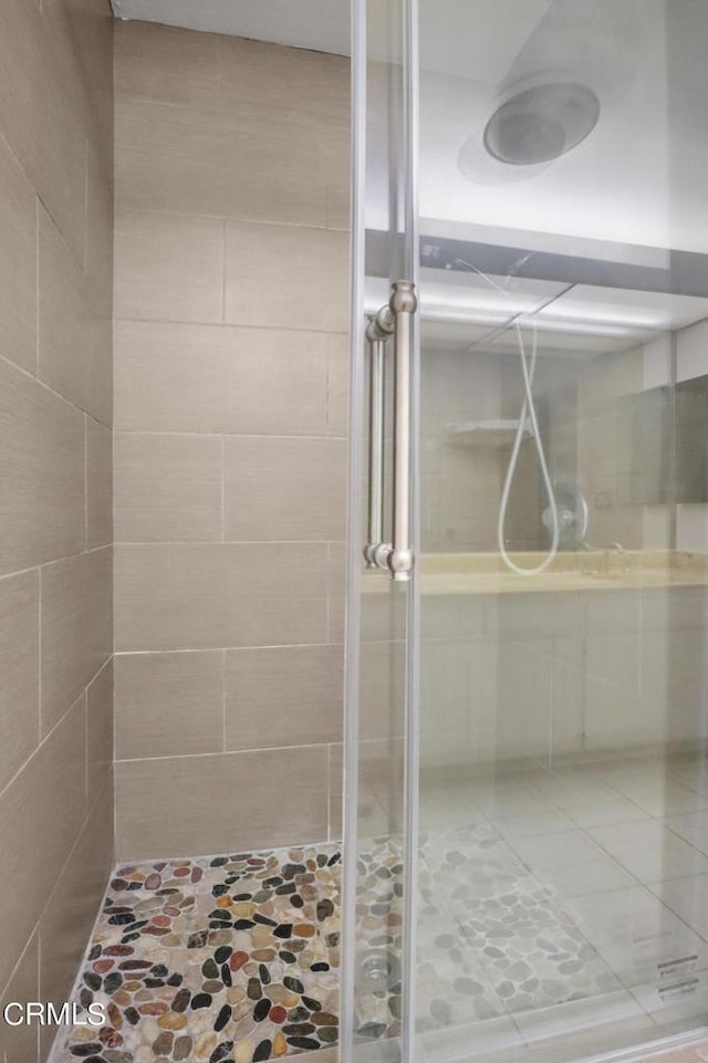 bathroom featuring walk in shower