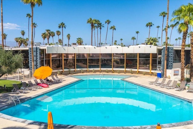 view of pool featuring a patio area