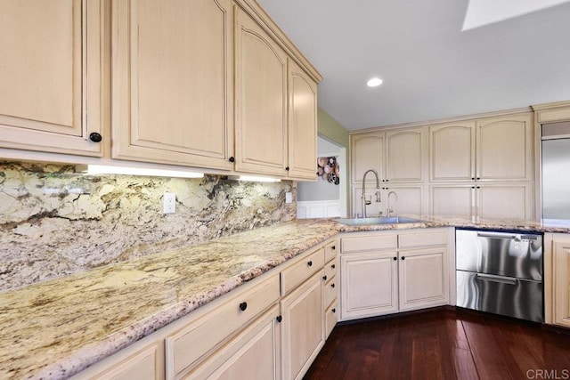 kitchen with light stone countertops, sink, dishwasher, dark hardwood / wood-style floors, and backsplash