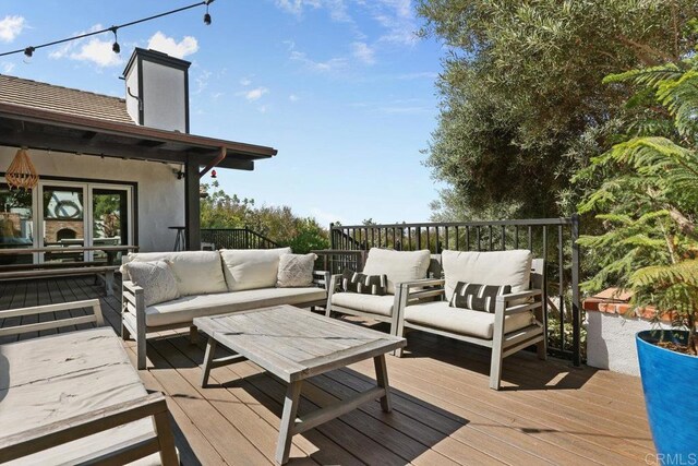 deck with an outdoor living space