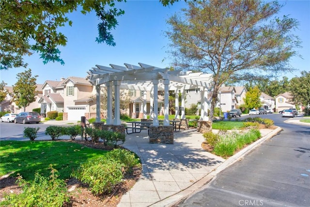 view of property's community featuring a pergola