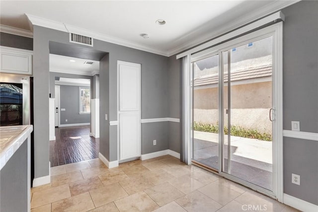 unfurnished dining area with a wealth of natural light, light hardwood / wood-style floors, and ornamental molding