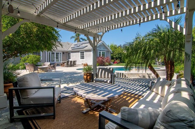 view of patio / terrace featuring a pergola and an outdoor living space