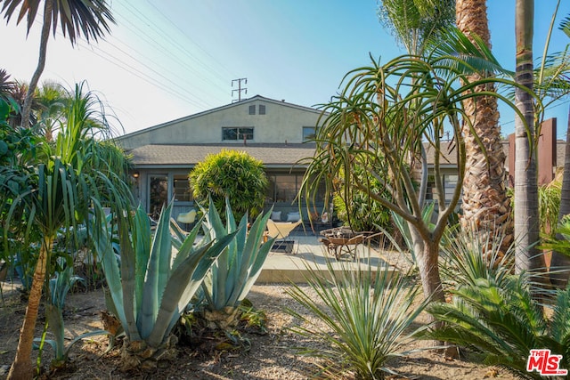 view of front of house with a patio