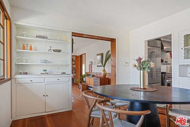 dining room featuring wood-type flooring