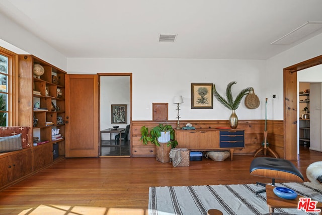 sitting room featuring light hardwood / wood-style floors