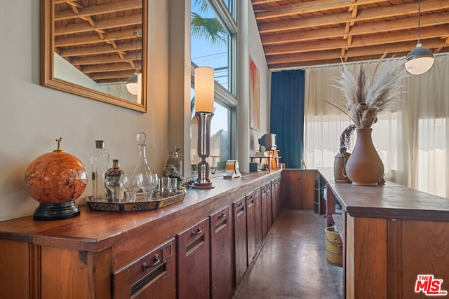 bar featuring butcher block counters