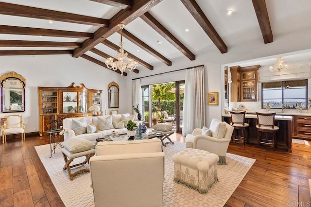 living room with an inviting chandelier, vaulted ceiling with beams, and dark wood-type flooring