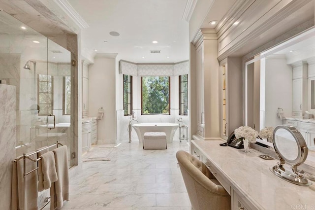 bathroom with ornamental molding, ornate columns, vanity, and separate shower and tub