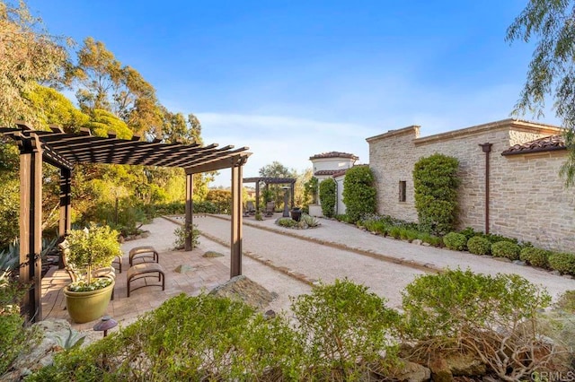 view of yard featuring a pergola and a patio area