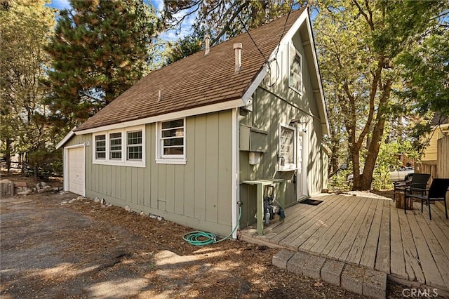 view of outbuilding featuring a garage