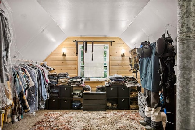 spacious closet with carpet and vaulted ceiling