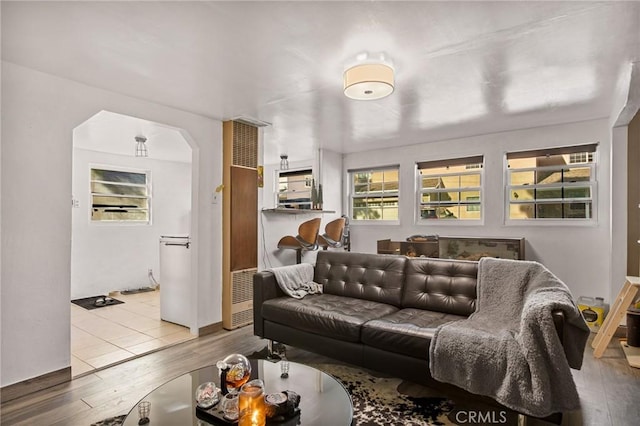 living room with light hardwood / wood-style flooring