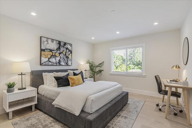 bedroom with light wood-type flooring