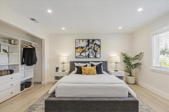 bedroom featuring light wood-type flooring