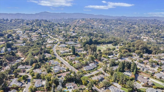 birds eye view of property featuring a mountain view