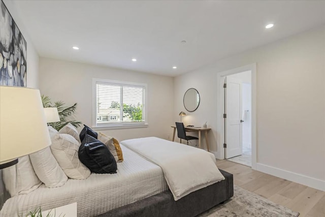 bedroom featuring light hardwood / wood-style floors