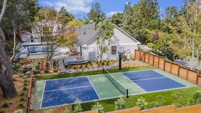 view of sport court featuring tennis court