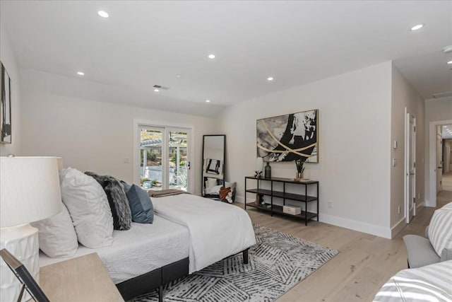 bedroom with light wood-type flooring