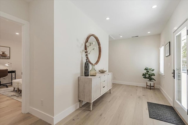 hall featuring light hardwood / wood-style flooring