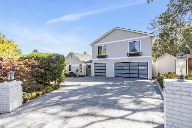 view of front of property with a garage