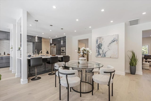 dining area featuring light hardwood / wood-style flooring