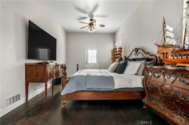 bedroom with wood-type flooring, visible vents, a ceiling fan, and baseboards