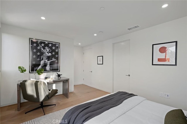 bedroom with light hardwood / wood-style flooring