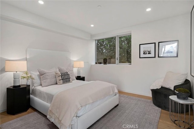 bedroom featuring light wood-type flooring