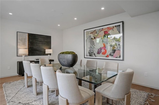 dining space featuring light hardwood / wood-style floors