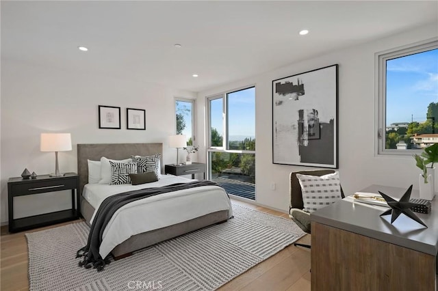 bedroom featuring light wood-type flooring